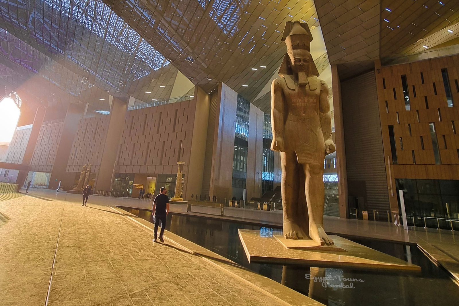 Visitors exploring the Grand Egyptian Museum in Cairo Egypt